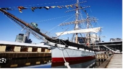 Historic sailing ship docked at port in Victoria, Australia.