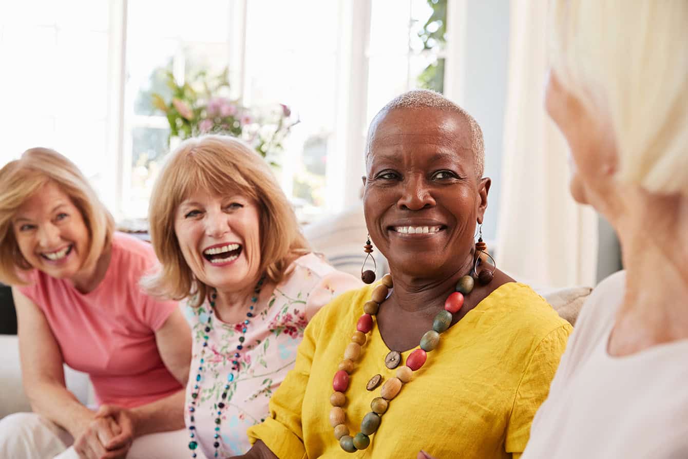 Senior women enjoying social time at Vineyard Park.