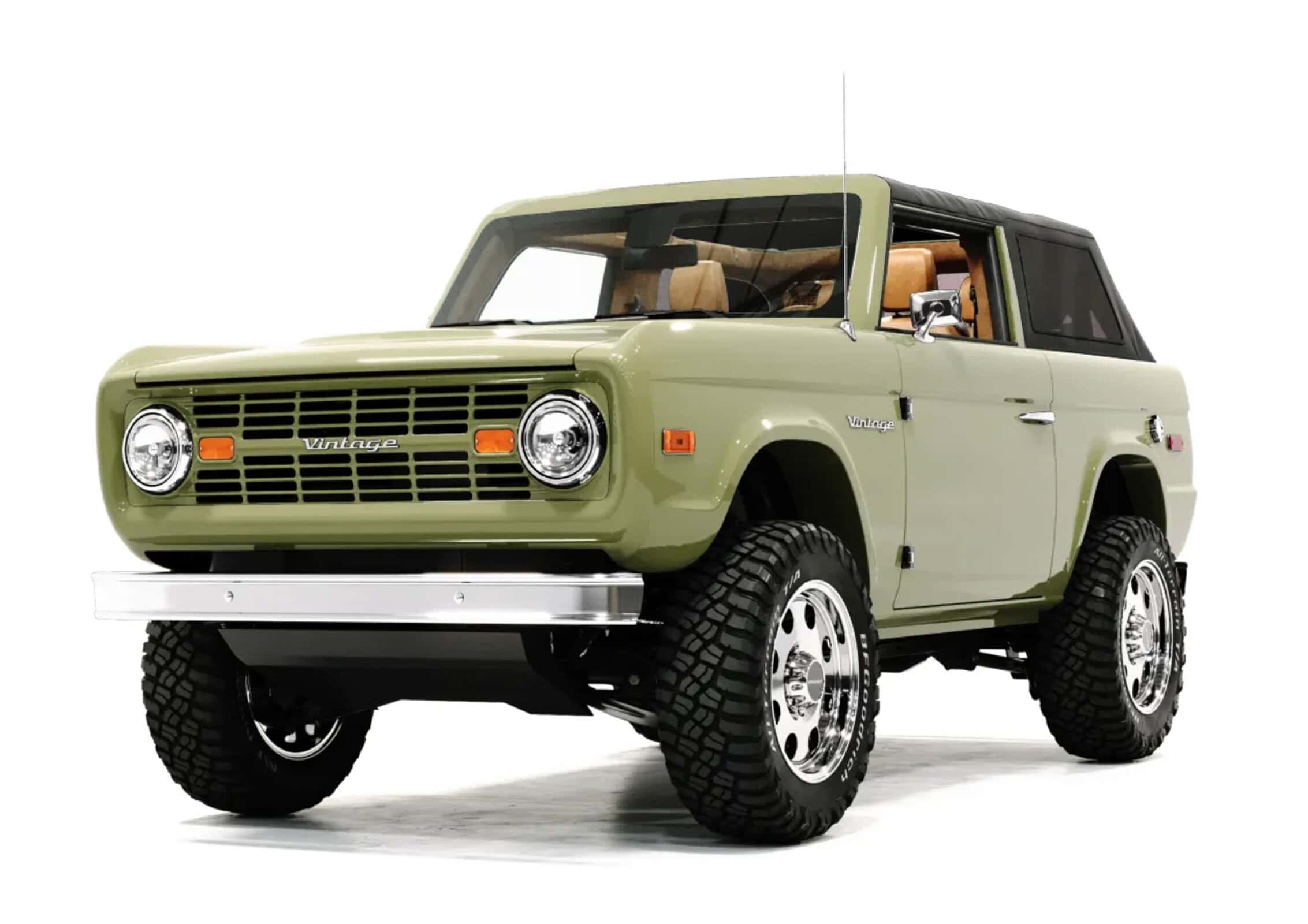 Vintage green off-road SUV with classic design, rugged tires, and retro interior, showcasing a blend of vintage charm and modern craftsmanship for stylish outdoor adventures.