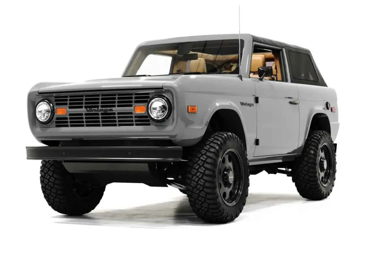 Vintage Modern classic off-road vehicle with rugged tires and retro design, perfect for outdoor adventures and vintage car enthusiasts.