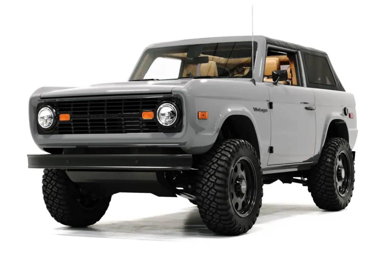 A vintage-style off-road SUV with rugged tires, classic design, and modern touches, perfect for adventure and outdoor exploration.