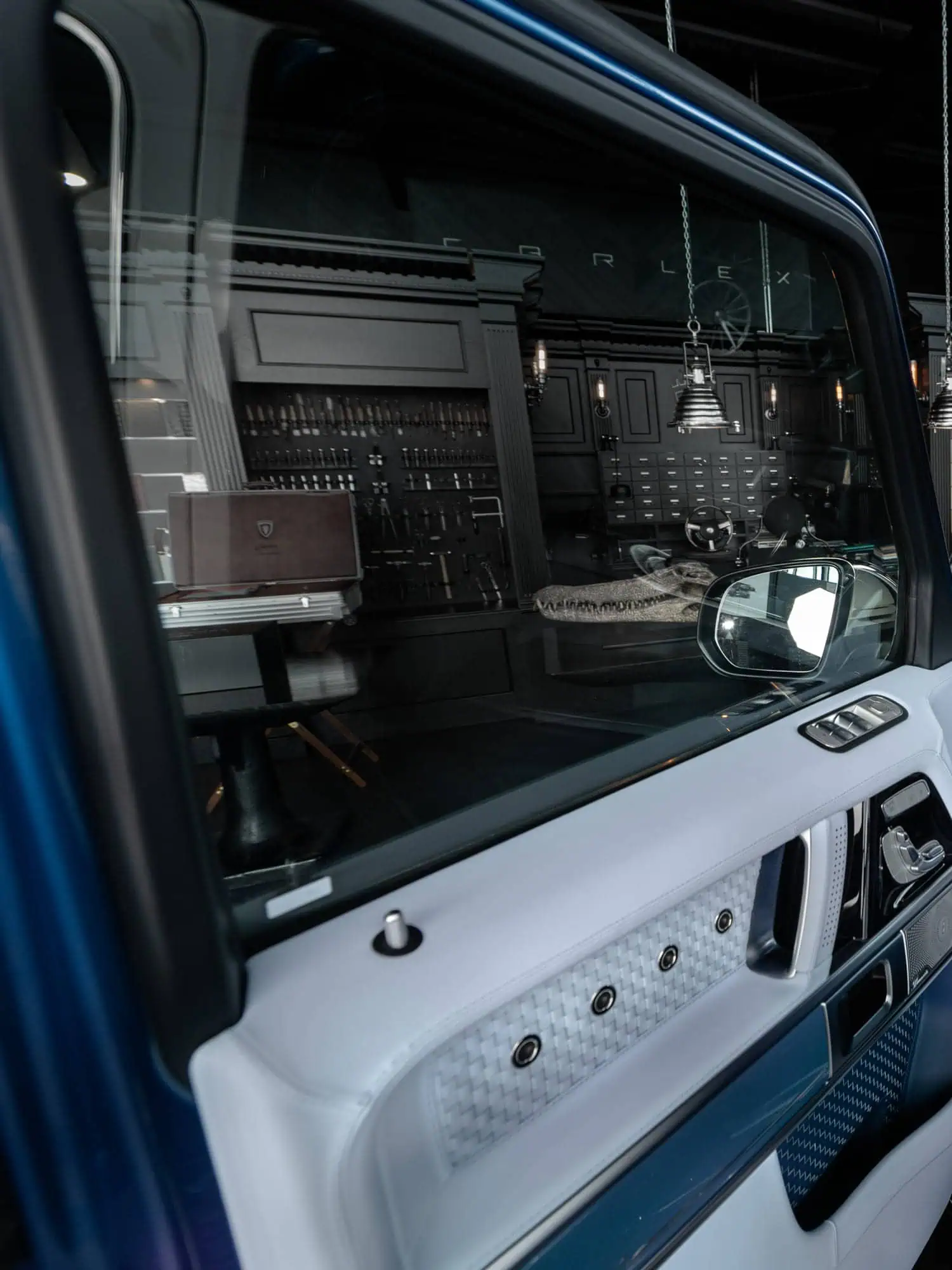 Close-up of a stylish vintage modern car dashboard with sleek design elements and high-quality materials, emphasizing luxury and timeless automotive style.