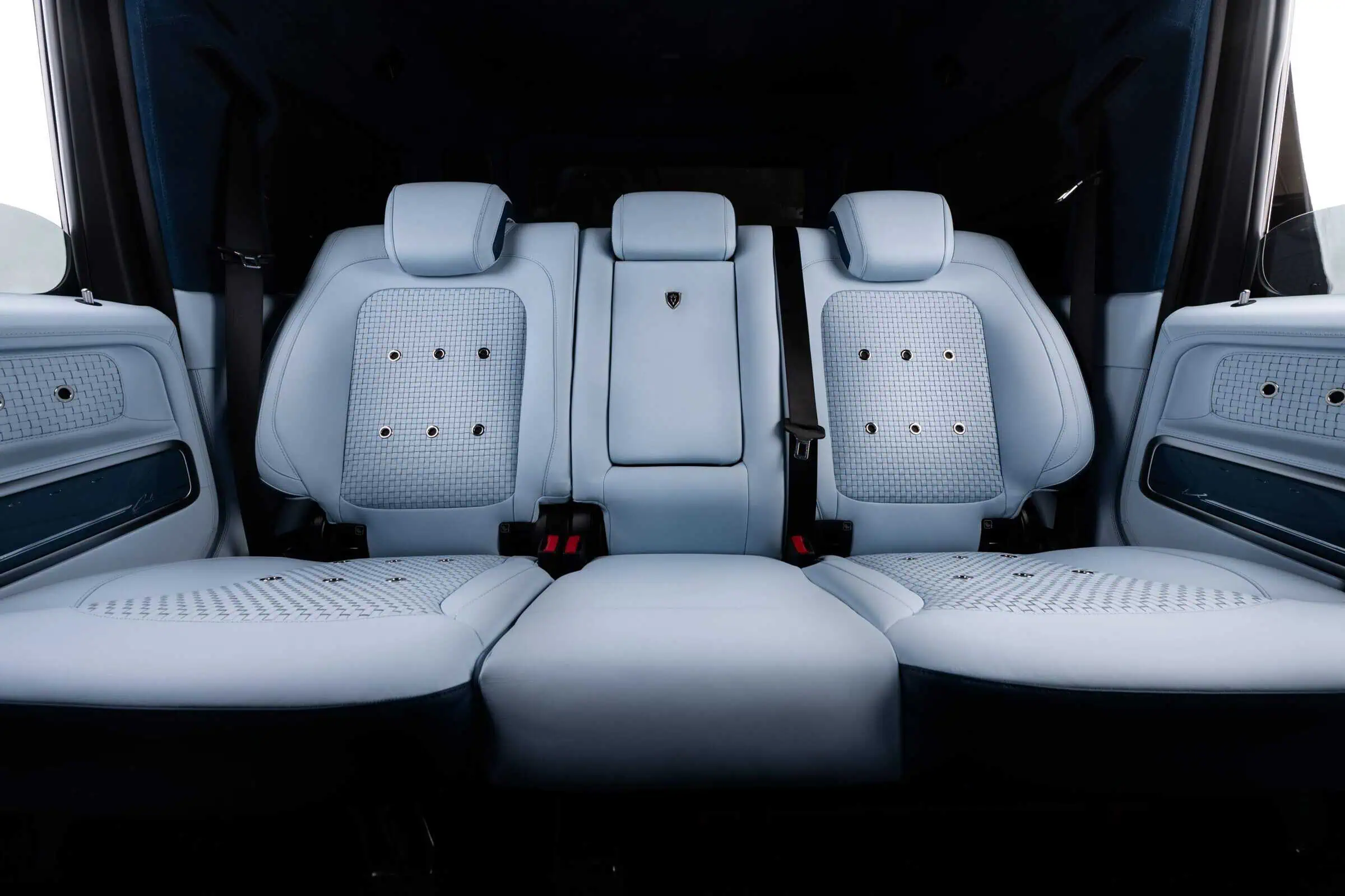 Premium white leather car seats with detailed stitching and headrests, perfect for modern and vintage-inspired automotive interior design.