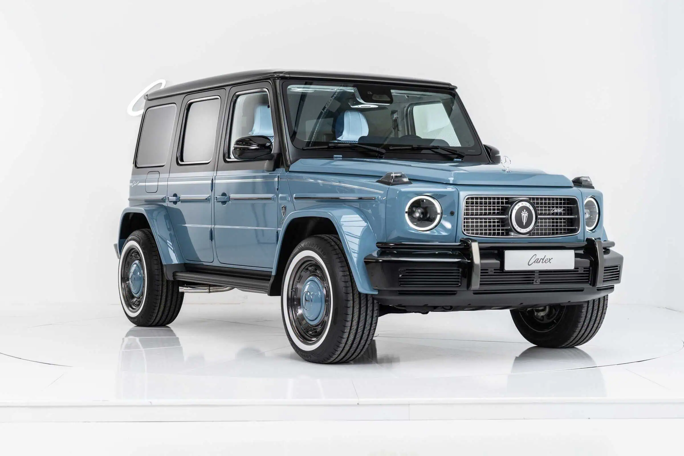 An eye-catching blue vintage SUV showcasing modern retro design and luxury features, perfect for car enthusiasts and collectors.