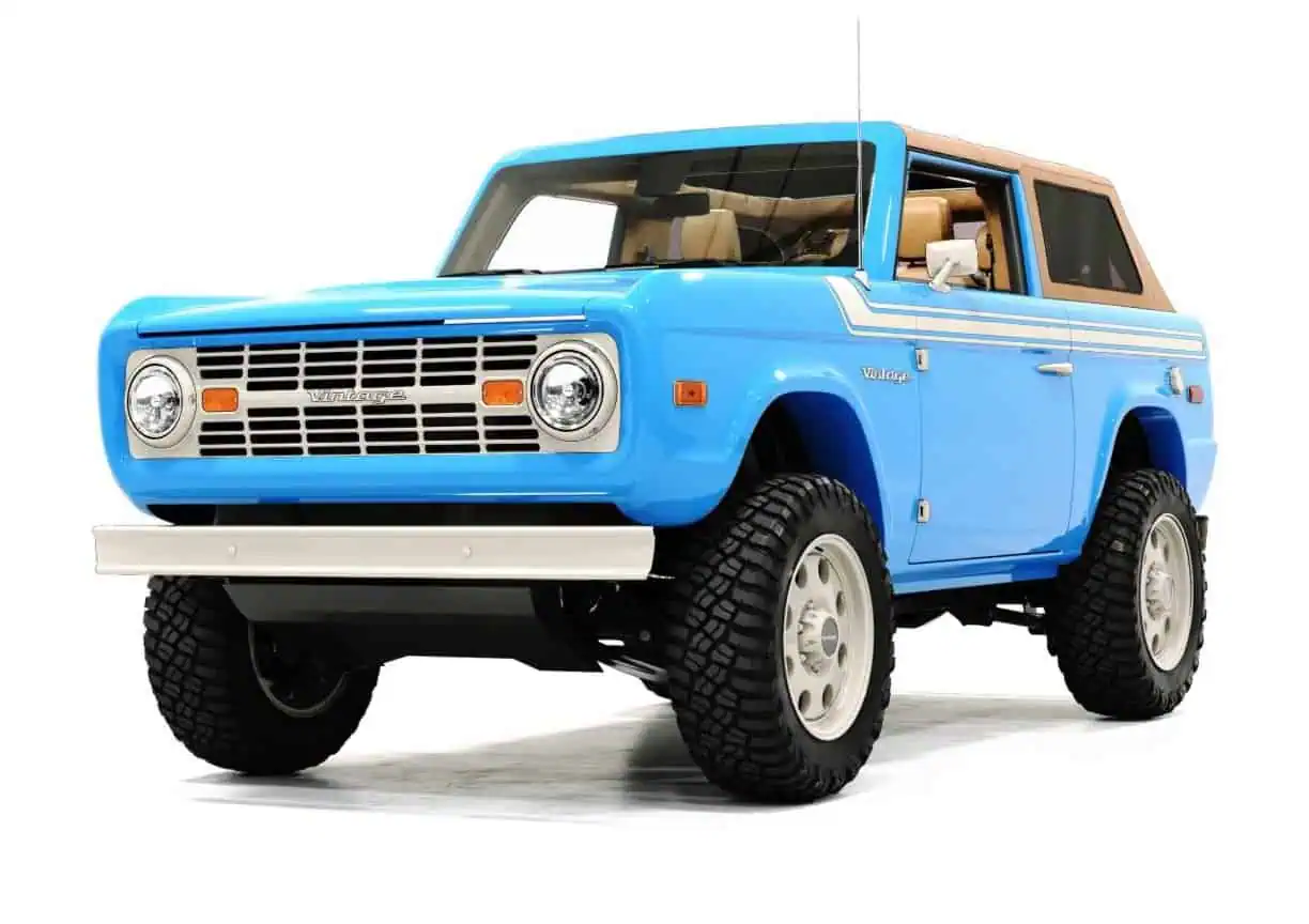 A vintage-style SUV in vibrant Grabber Blue with retro design elements, perfect for enthusiasts of classic modern vehicles and bold color accents.