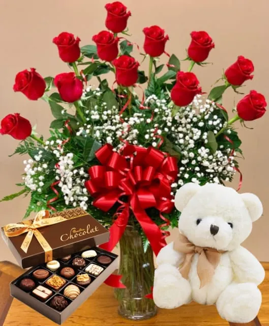 12 red roses and teddy bear