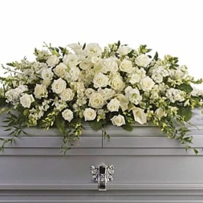 white funeral casket spray
