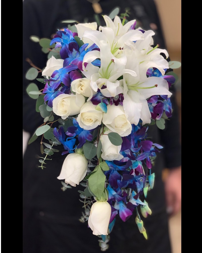 cascade white and blue bridal bouquet las vegas wedding flowers