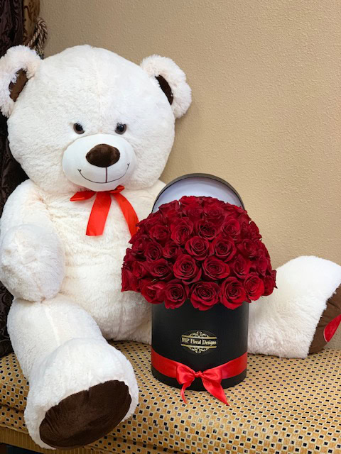 LARGE TEDDY BEAR AND RED ROSES