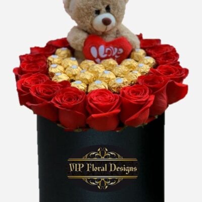 hat box with teddy bear and chocolate