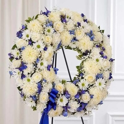 White and blue funeral Wreath