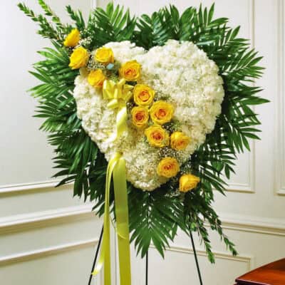 white and Yellow full heart standing spray