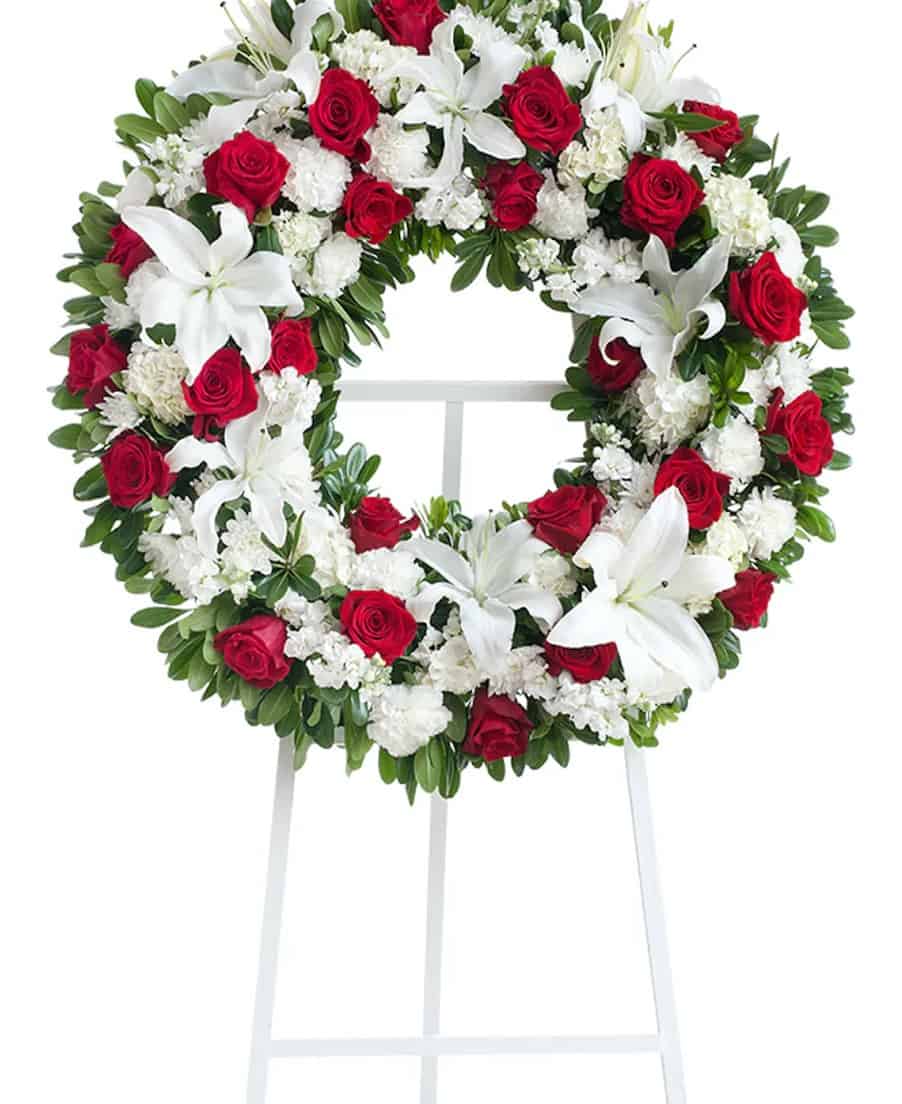 red and white wreath stand