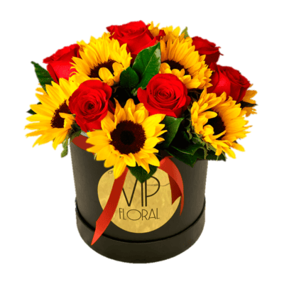 sunflowers and red roses in a box