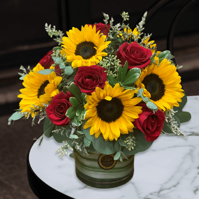 sunflowers and red roses centerpiece