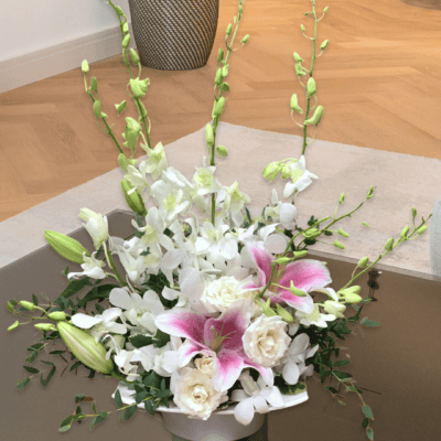 Discover our 'Orchid Whispered Wishes' bouquet with fragrant pink oriental lilies and exquisite orchids – a delicate, heartfelt gift for special moments.