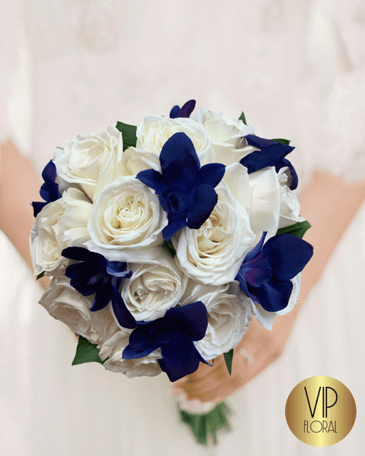 Royal Bridal Bouquet Las Vegas with white roses and blue orchids