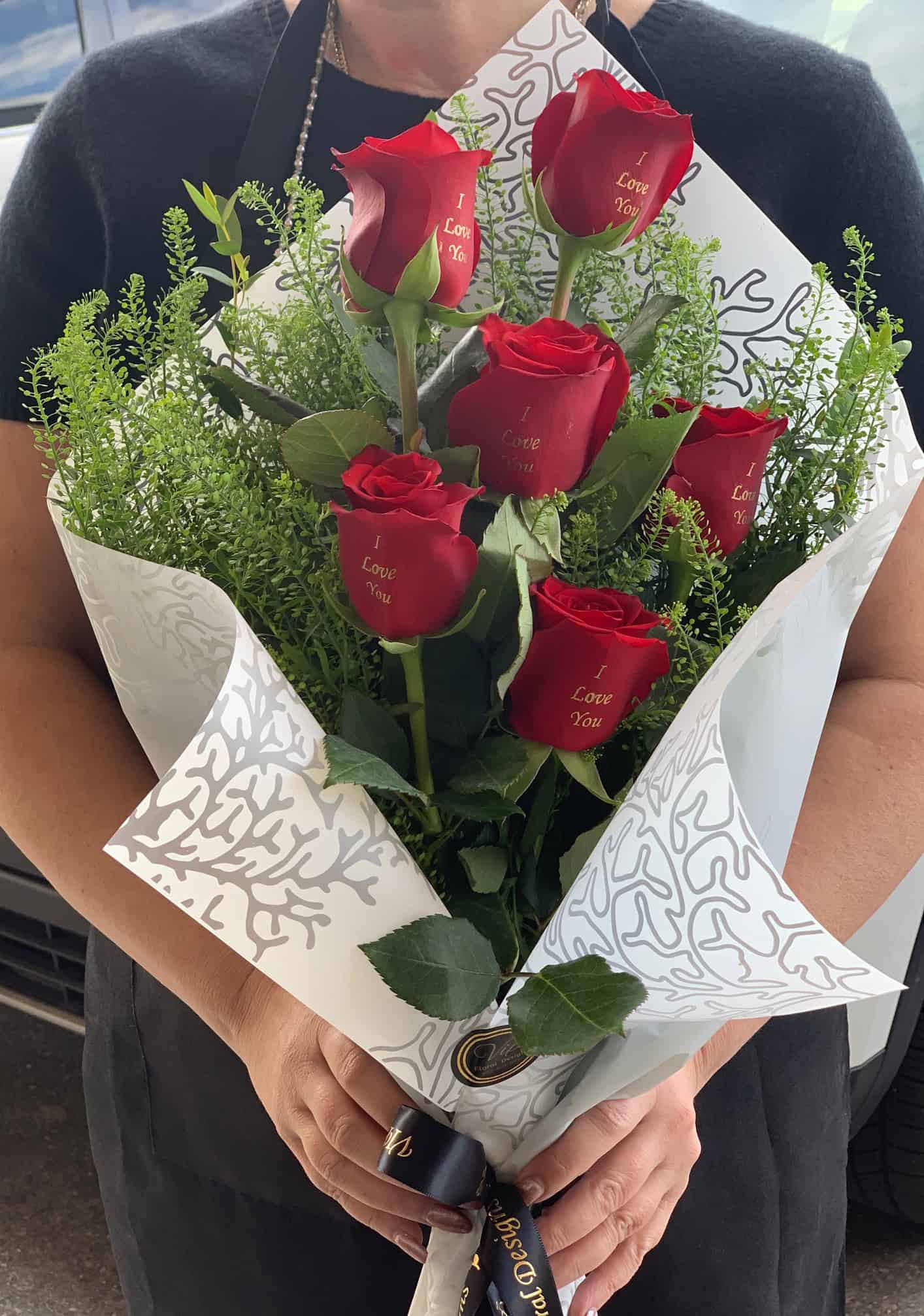 i love you bouquet with 6 red roses printed, embossed right on rose petals.