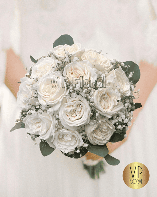 Vegas Vows Bridal Bouquet it's a special wedding traditional bridal bouquet with 12 white roses, bab's breath and eucalyptus.
