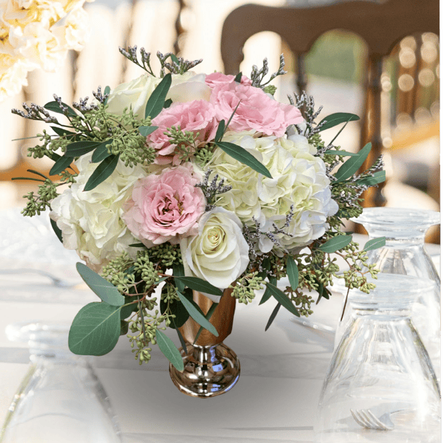 the Elegance in Bloom Centerpieces las vegas convention flowers