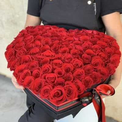 Elegant heart-shaped box filled with vibrant red roses symbolizing love and passion. Perfect for romantic gestures or special occasions.