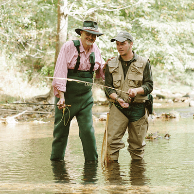 Fishing enthusiasts enjoying a scenic day in Hardy County, WV, with lush nature and clear waters.