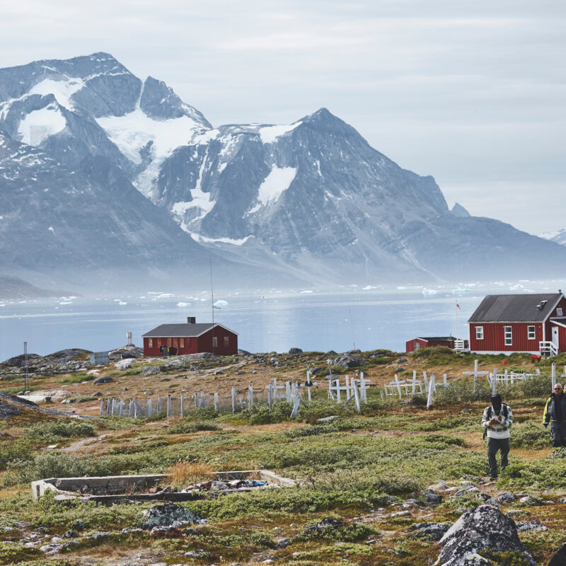 Three hikers in Qoornoq in summer. Photo by Peter Lindstrom - Visit Greenland