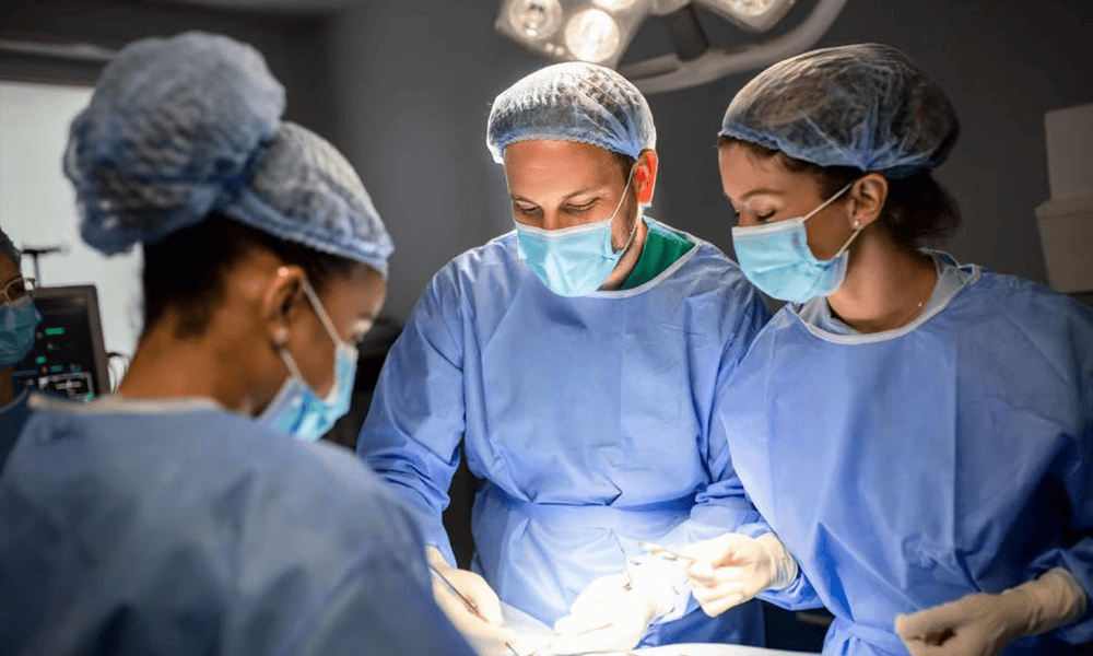 A team of surgeons performing gender confirmation surgery at VJ Transgender Clinics, specialized in transgender healthcare and surgical procedures.