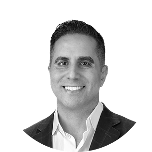 Professional portrait of a Voro team member in business attire.