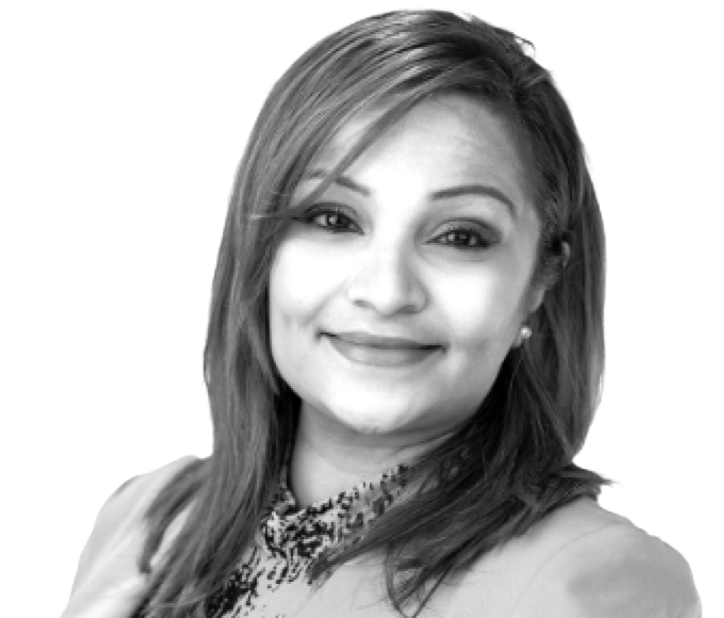 Black and white portrait of a smiling woman for About us page.