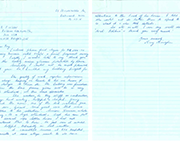 Handwritten letter on lined paper with blue ink.