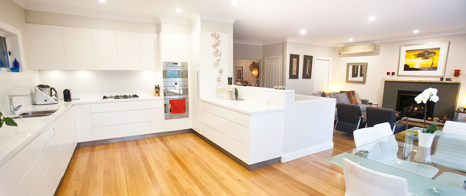 Bright, contemporary kitchen and living space in a Sydney residential home.