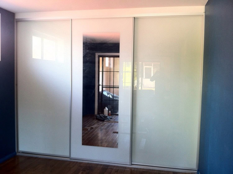White sliding wardrobe with mirror for Sydney homes and wardrobes.
