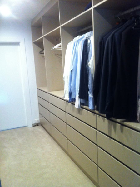 Wardrobe storage with hanging space and drawers in Sydney.