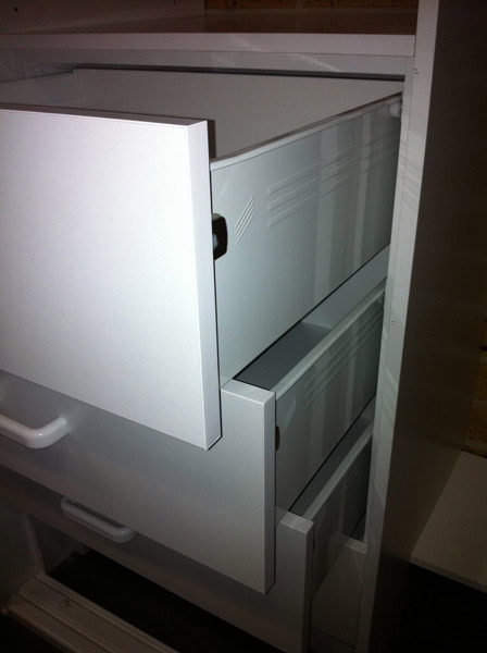 White wardrobe drawers with smooth sliding mechanisms, ideal for custom storage solutions in Sydney.