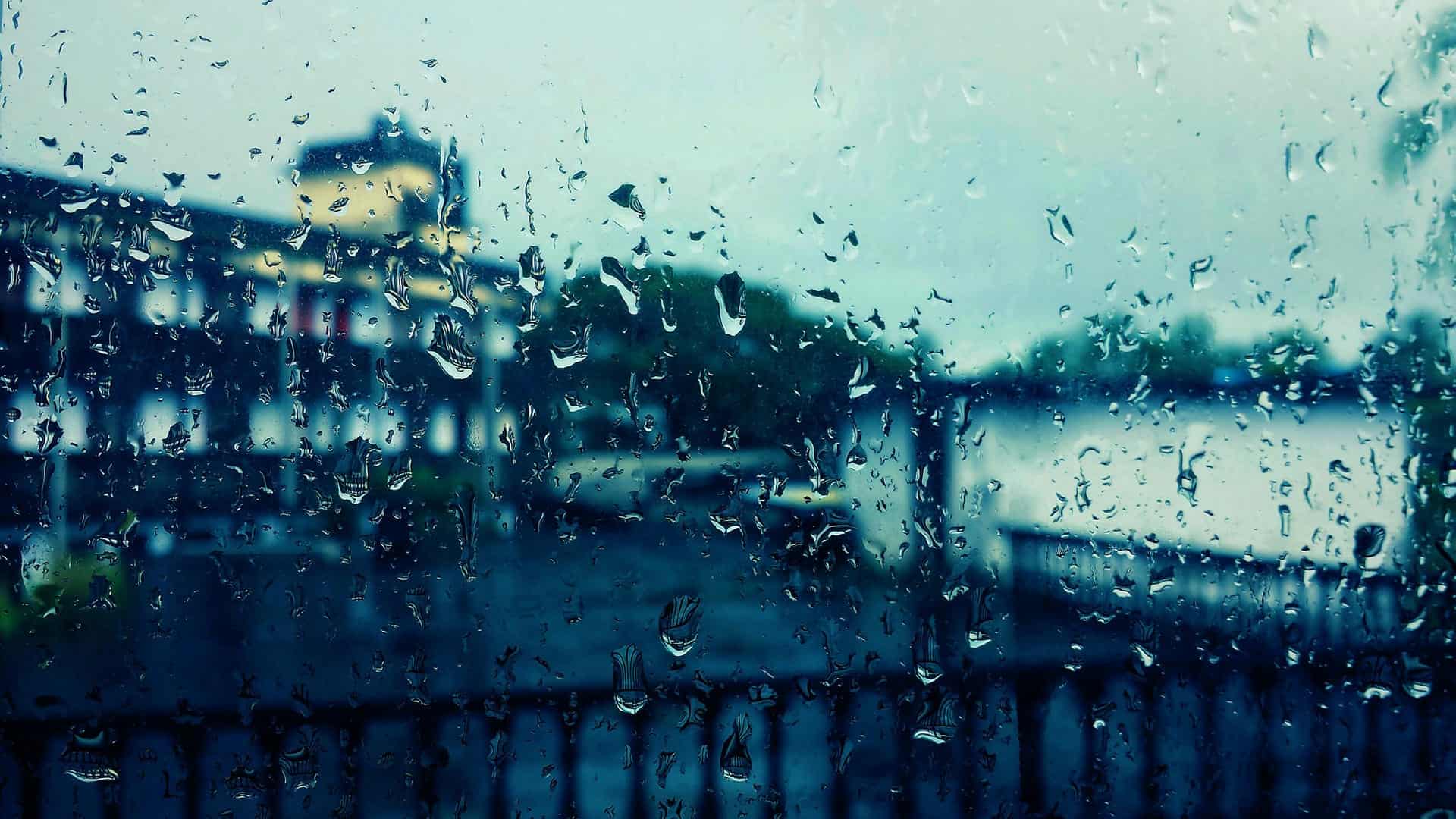 an image of a block of flats in the middle of a storm