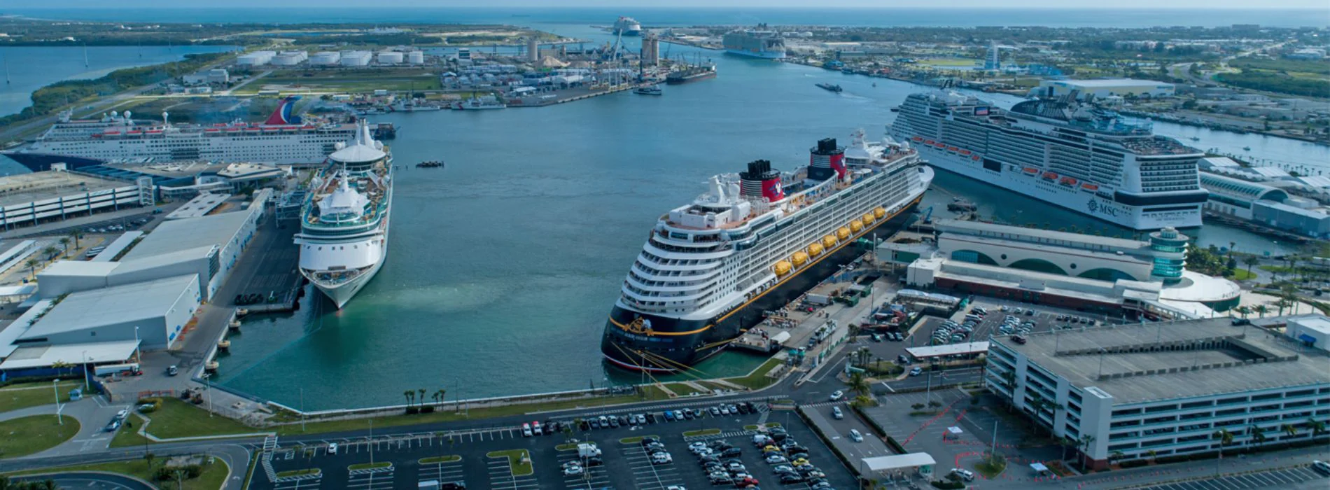 Cruise ships docked at Port Canaveral with private transportation access