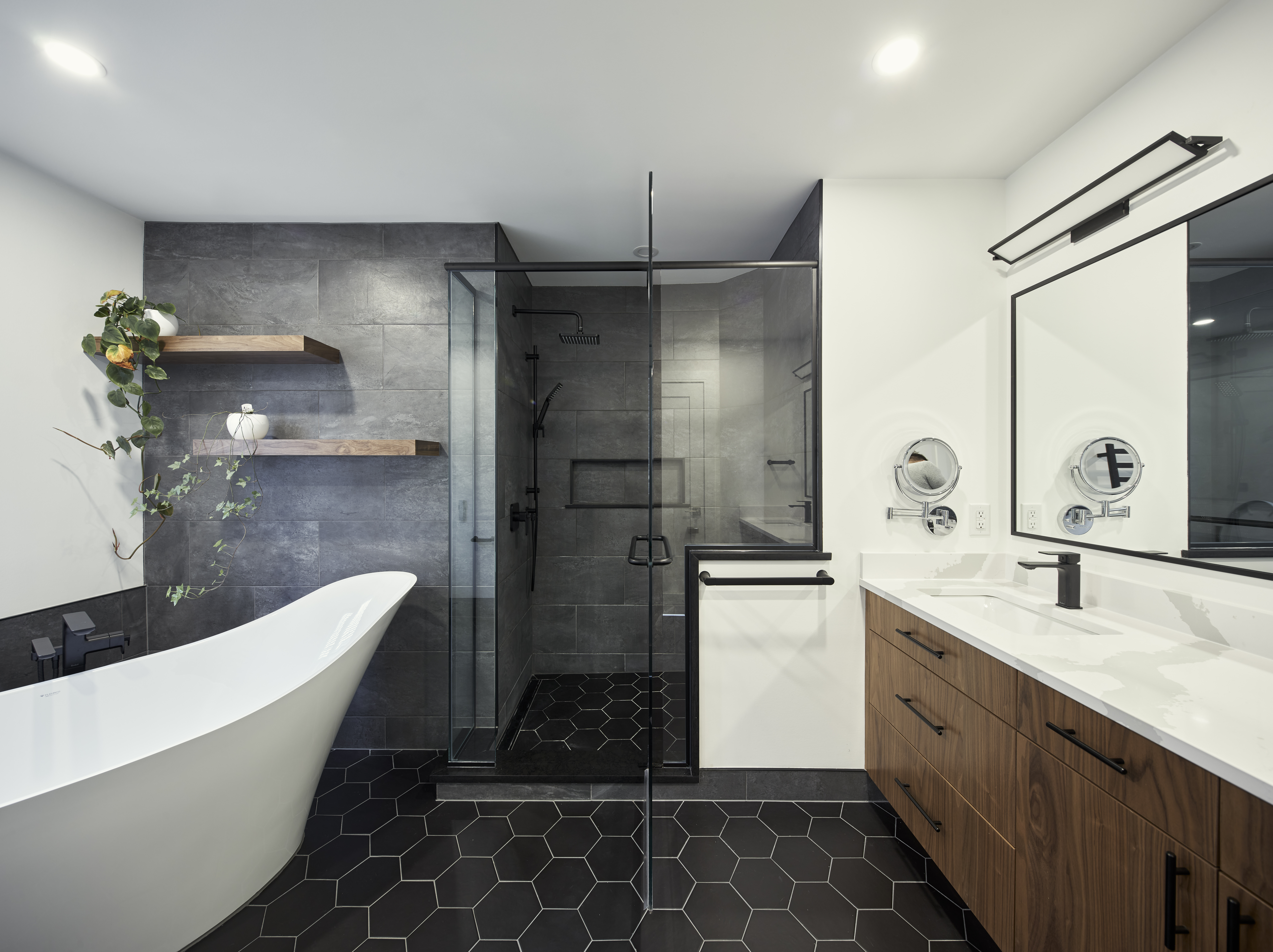 Ottawa bathroom renovation with tiled shower and freestanding tub