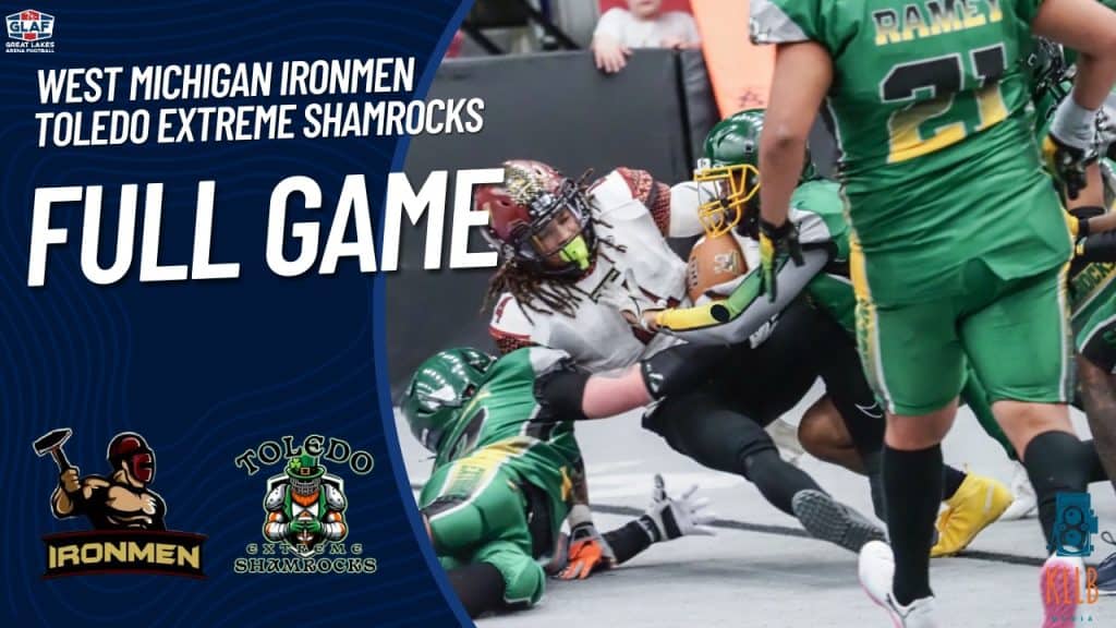 West Michigan Ironmen football players in action during a game.