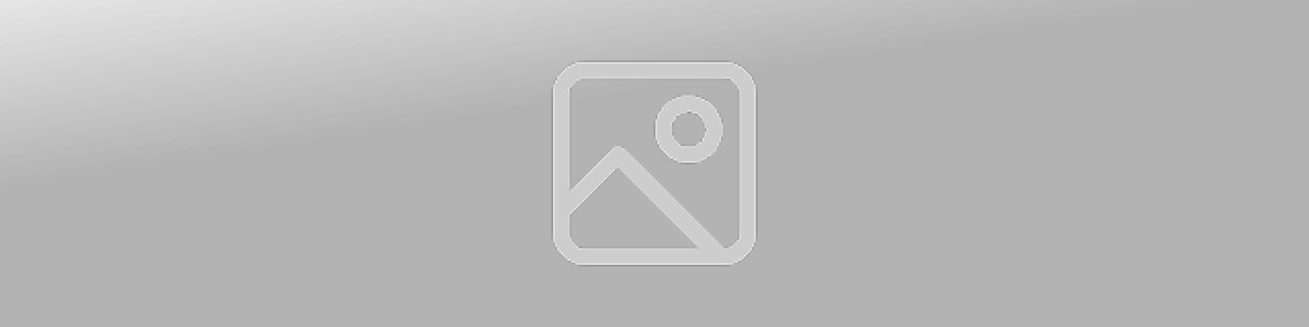 West Michigan Ironmen football team in action on the field.