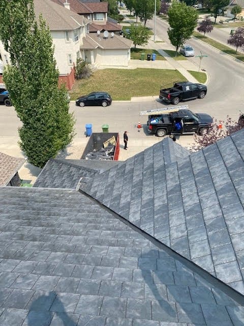 Euroshield rubber roofing installed on a steep-sloped residential roof in Calgary, showing clean lines and textured surface designed for hail resistance and long-term durability.