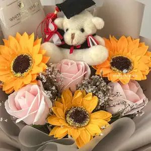 beautiful Flowers bouquet with taddy