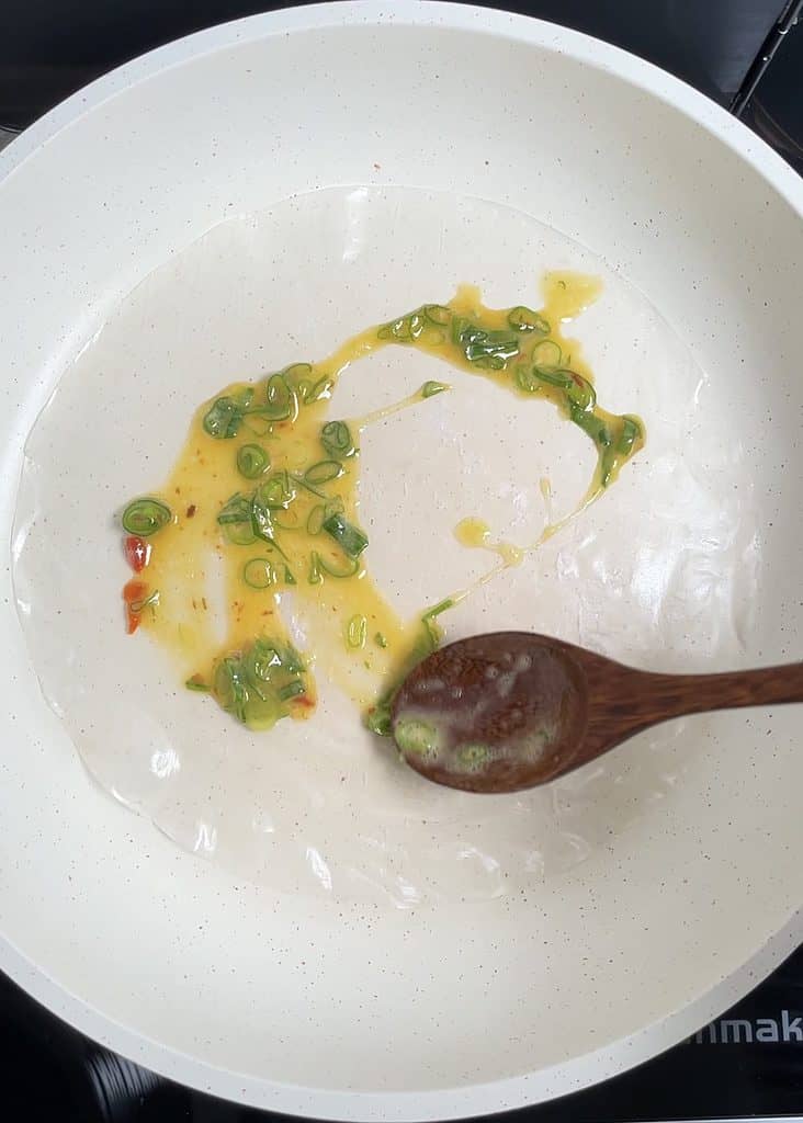 spreading eggs on the rice paper