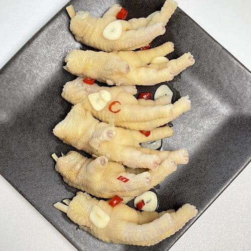 pickled chicken feet served