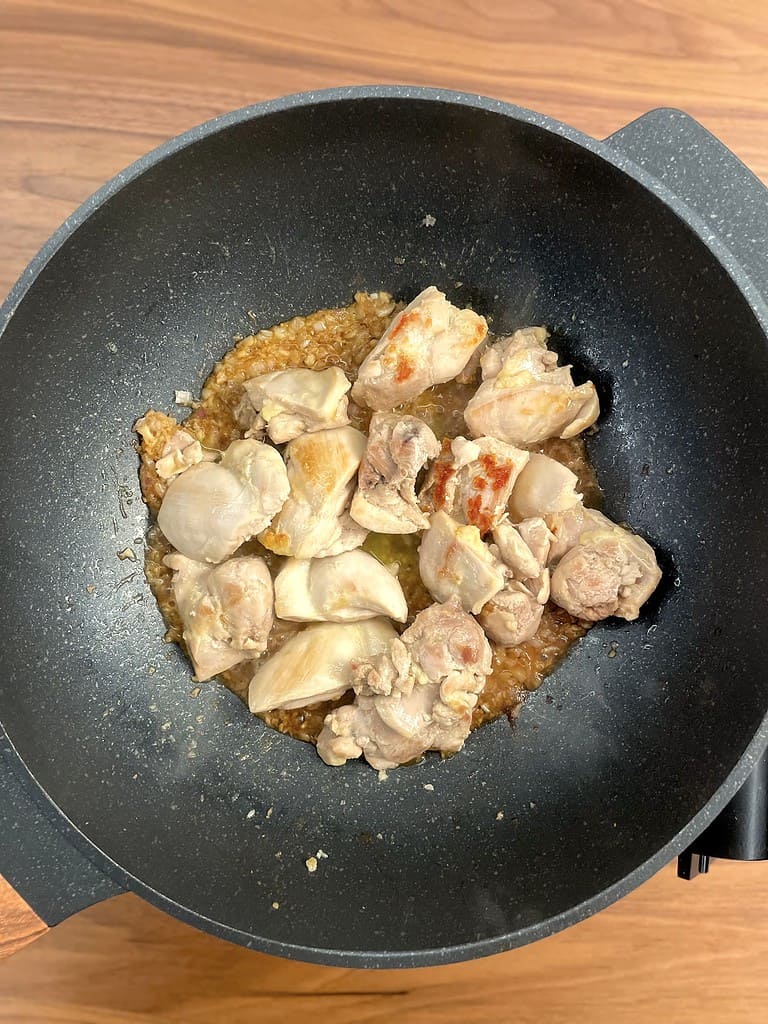 add chicken with the garlic shallot