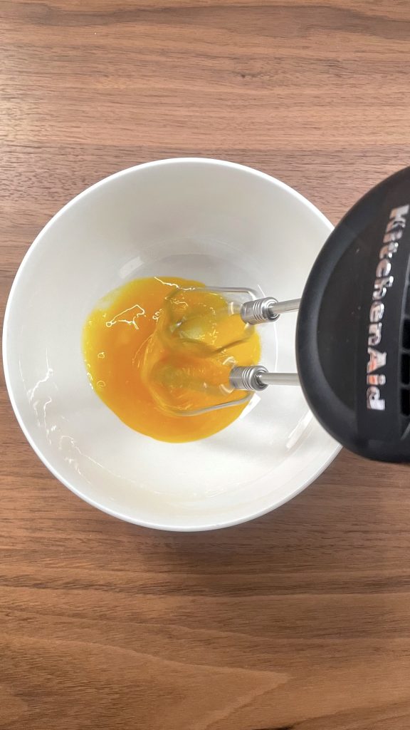 mix egg yolk salt and garlic 2