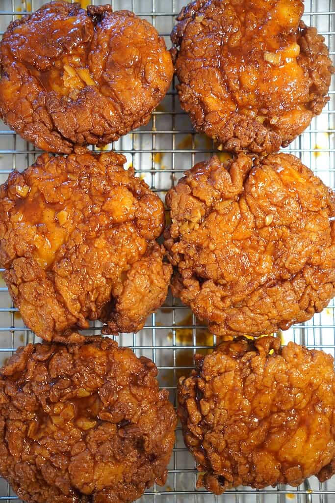 Press the flour into the chicken to create those craggy, crispy bits.