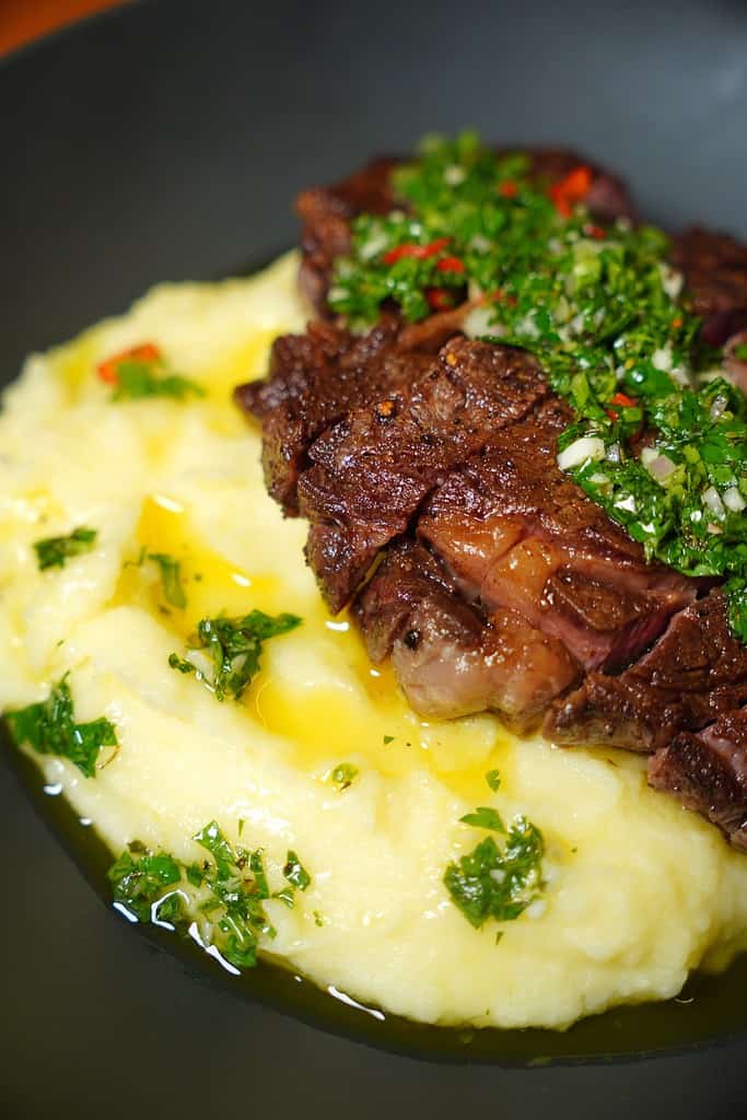 Chimichurri Over Steak and Mashed Potatoes