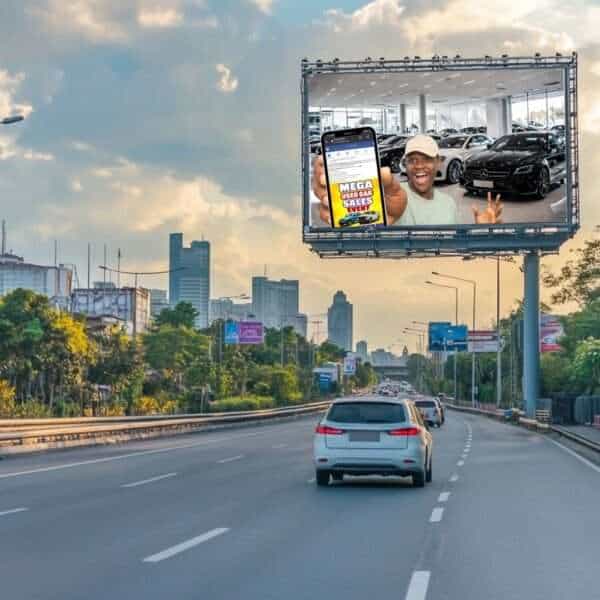 Automotive advertising billboard showing facebook sales event