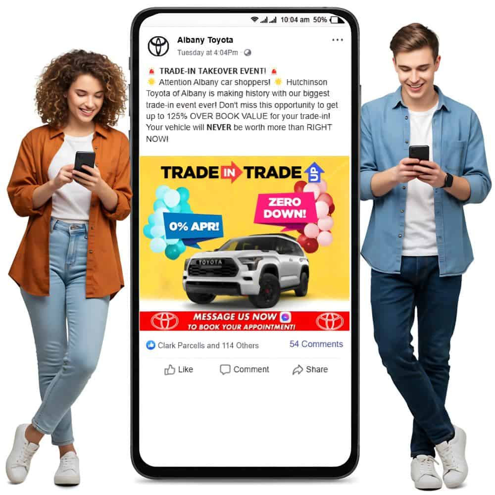 Two people review their phones in front of a social media post showcasing Willowood Ventures’ Toyota trade-in event, featuring a white SUV and eye-catching dealership marketing banners.